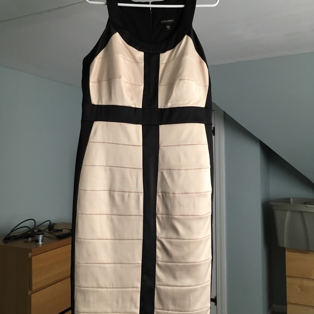 Black and cream knee length dress